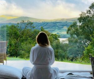 Start meditating today - woman sitting looking out of window