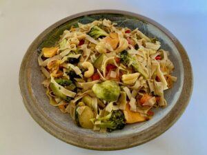 Plate of gluten free noodles with vegetables
