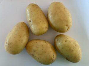 Washed, raw potatoes