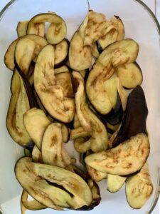 Rinsed slices of eggplant