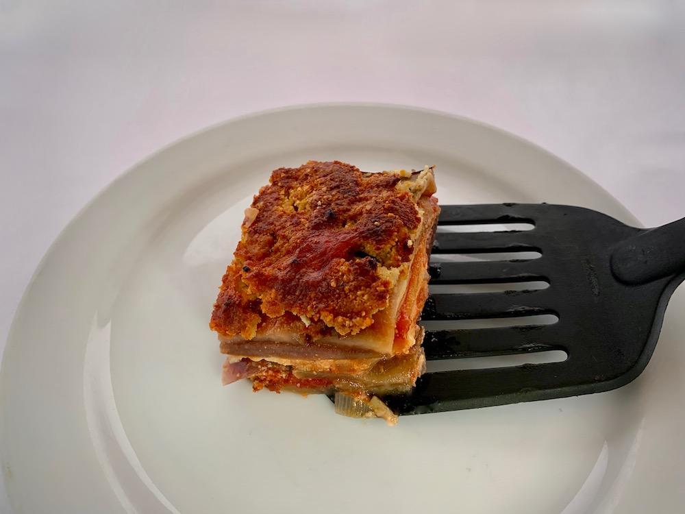 Slice of vegan eggplant parmesan