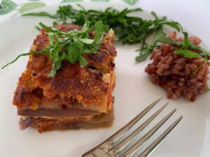 Slice of vegan eggplant parmesan