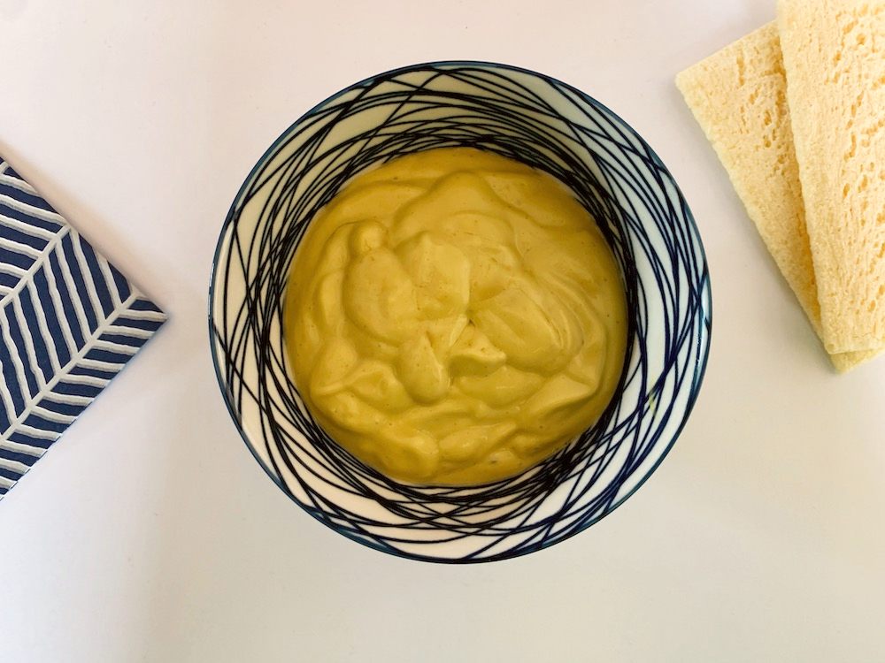 Bowl of vegan mayonnaise made with avocado oil