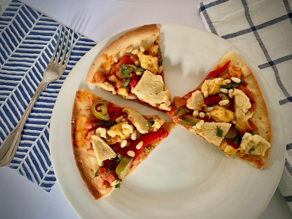 Three slices of vegan pizza