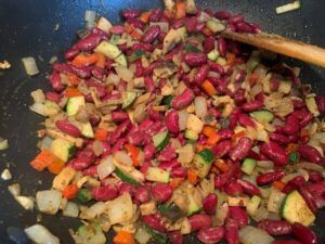 Beans added to fried onions
