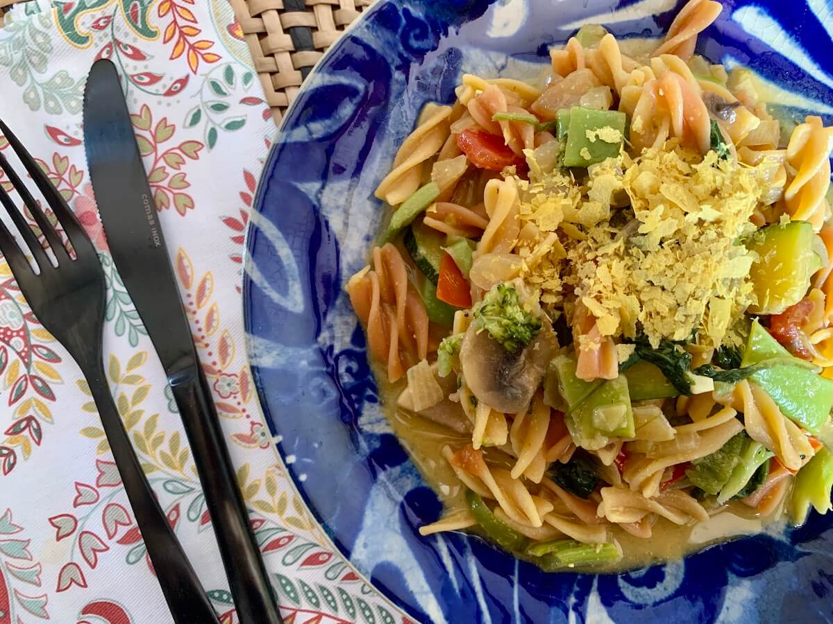 Creamy Vegetable pasta with nutritional yeast on top