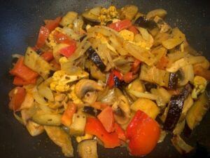 Frying the base for eggplant curry