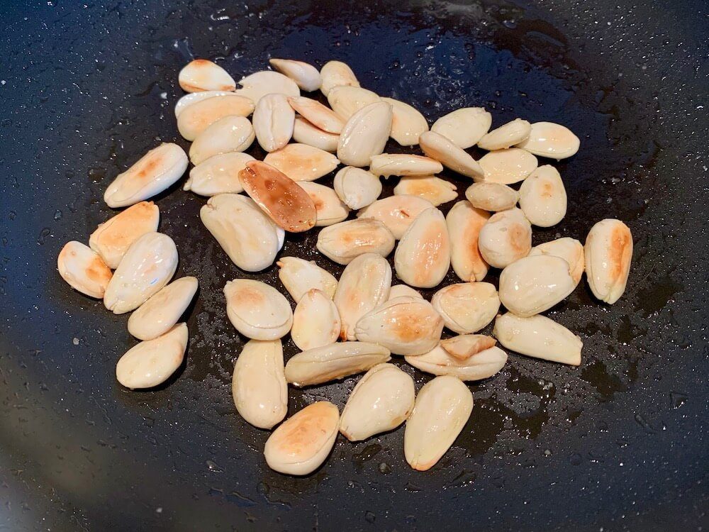 Frying almonds