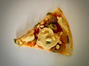 Slice of vegan pizza