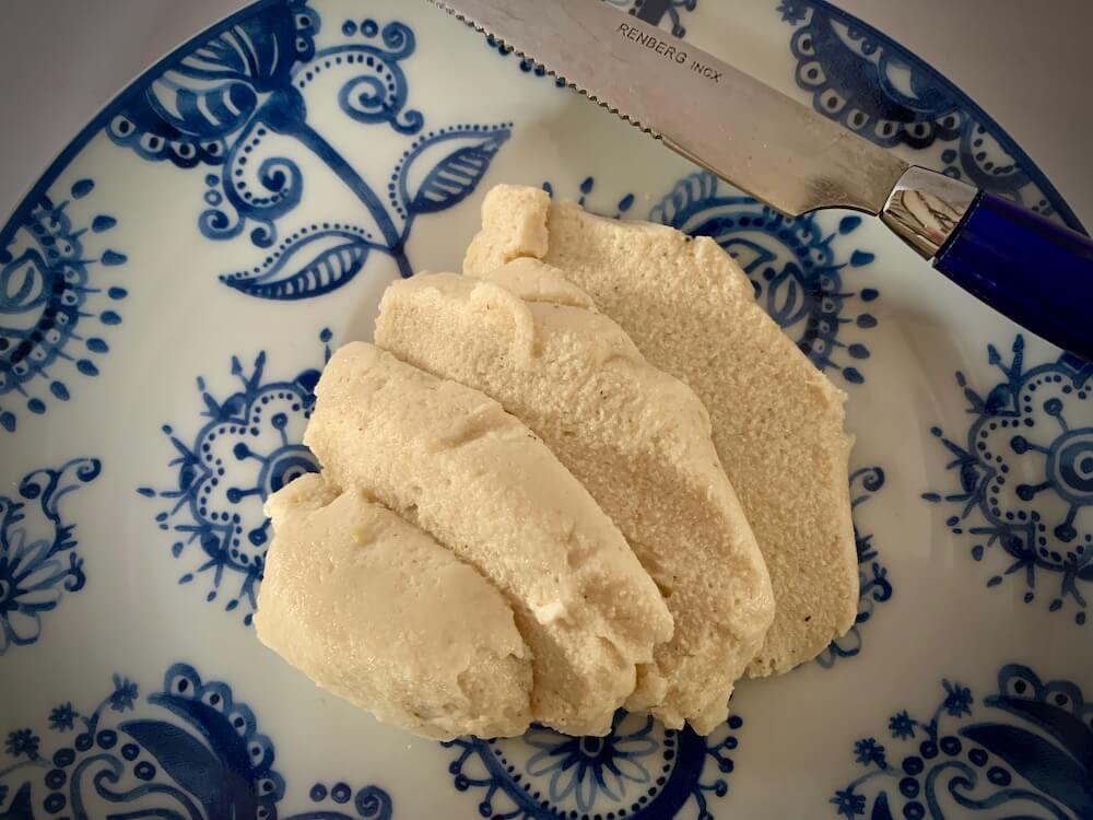 Sliced vegan mozzarella on a plate