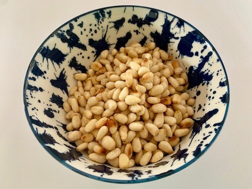 Bowl of toasted pine nuts