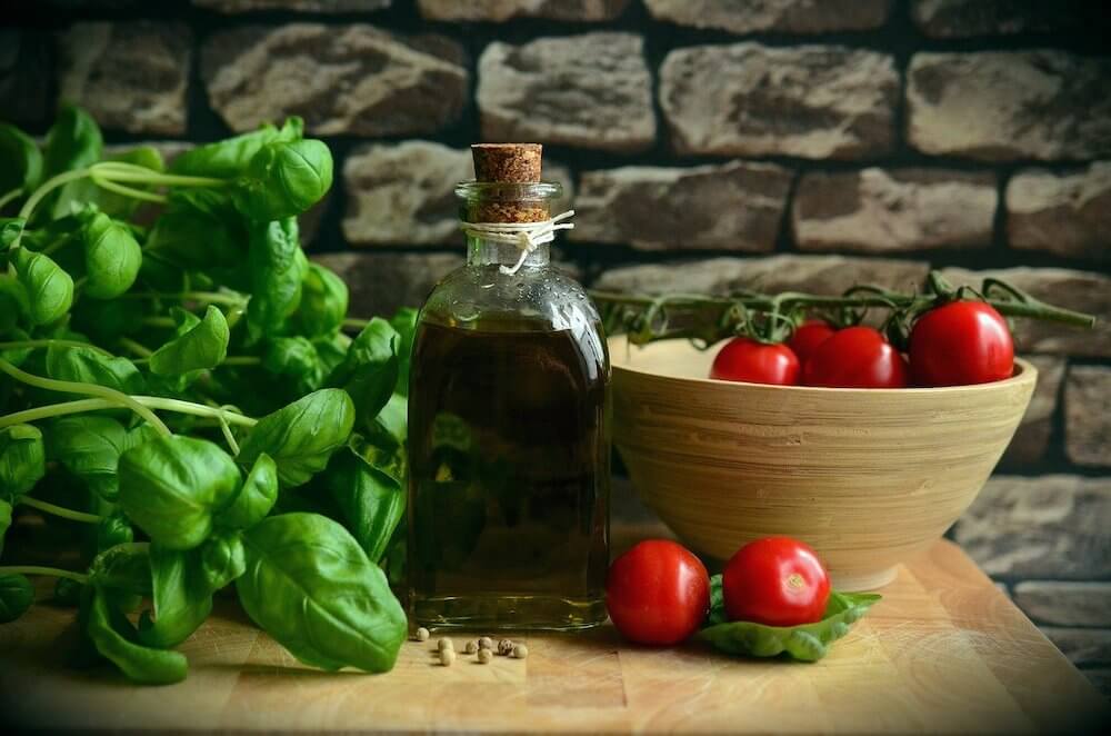 Fresh basil, olive oil and cherry tomatoes