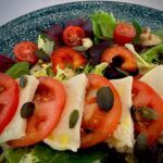 Close up of vegan mozzarella & tomato salad