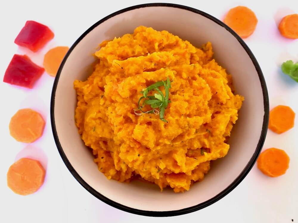 Bowl of carrot and sweet potato mash