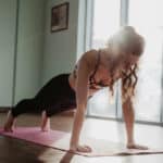 How to build strength for Chaturanga Dandasana picture of woman in plank pose