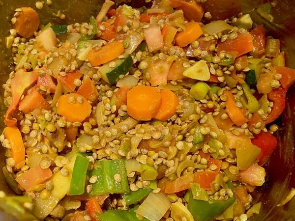 Frying vegetables with lentils for lentil stew
