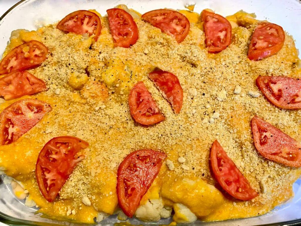 Vegan cauliflower cheese in a casserole before cooking