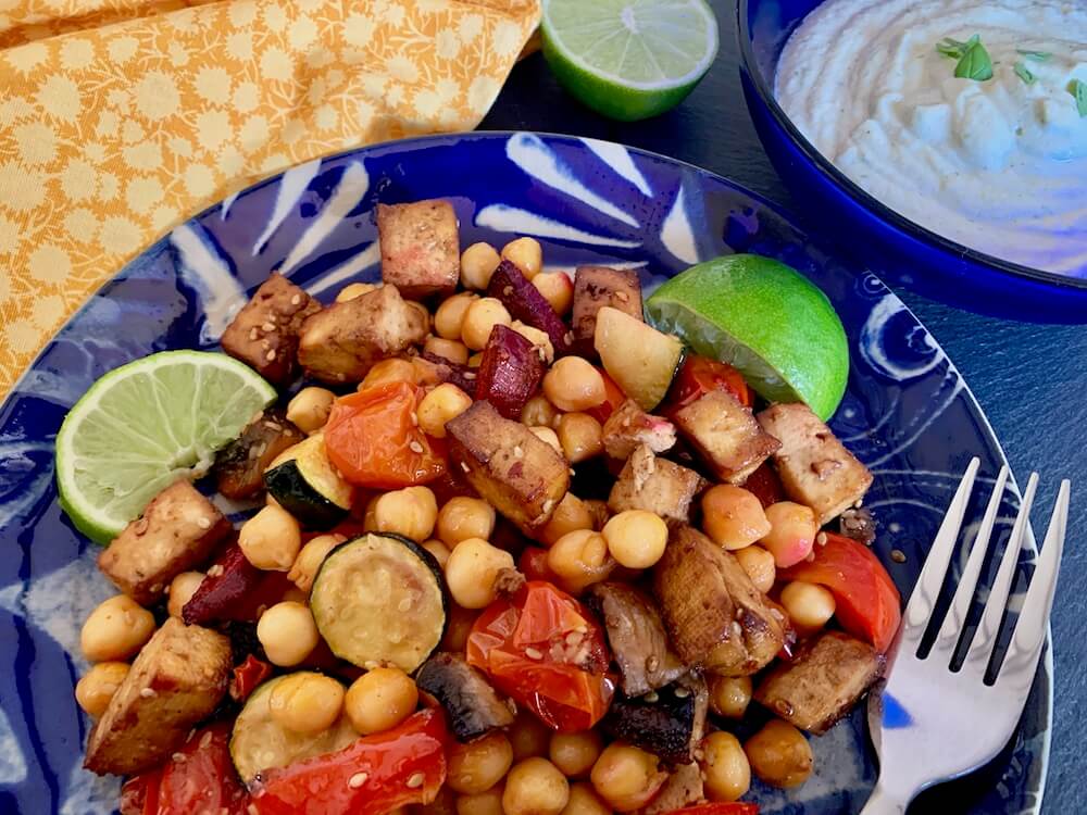 Baked tofu with vegetables, chick peas, lime juice and garlic sauce