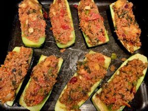 Quinoa and tomato stuffed zucchini boats