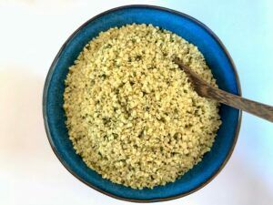 Blue bowl full of hemp seed