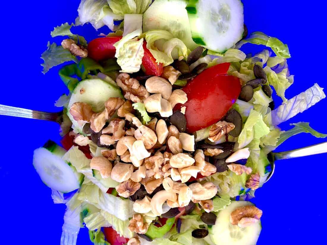Blue background with salad