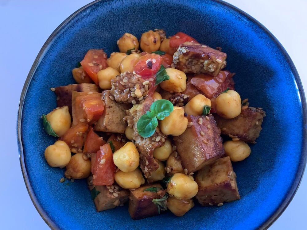 Bowl of tofu and chickpeas to beat menopause naturally