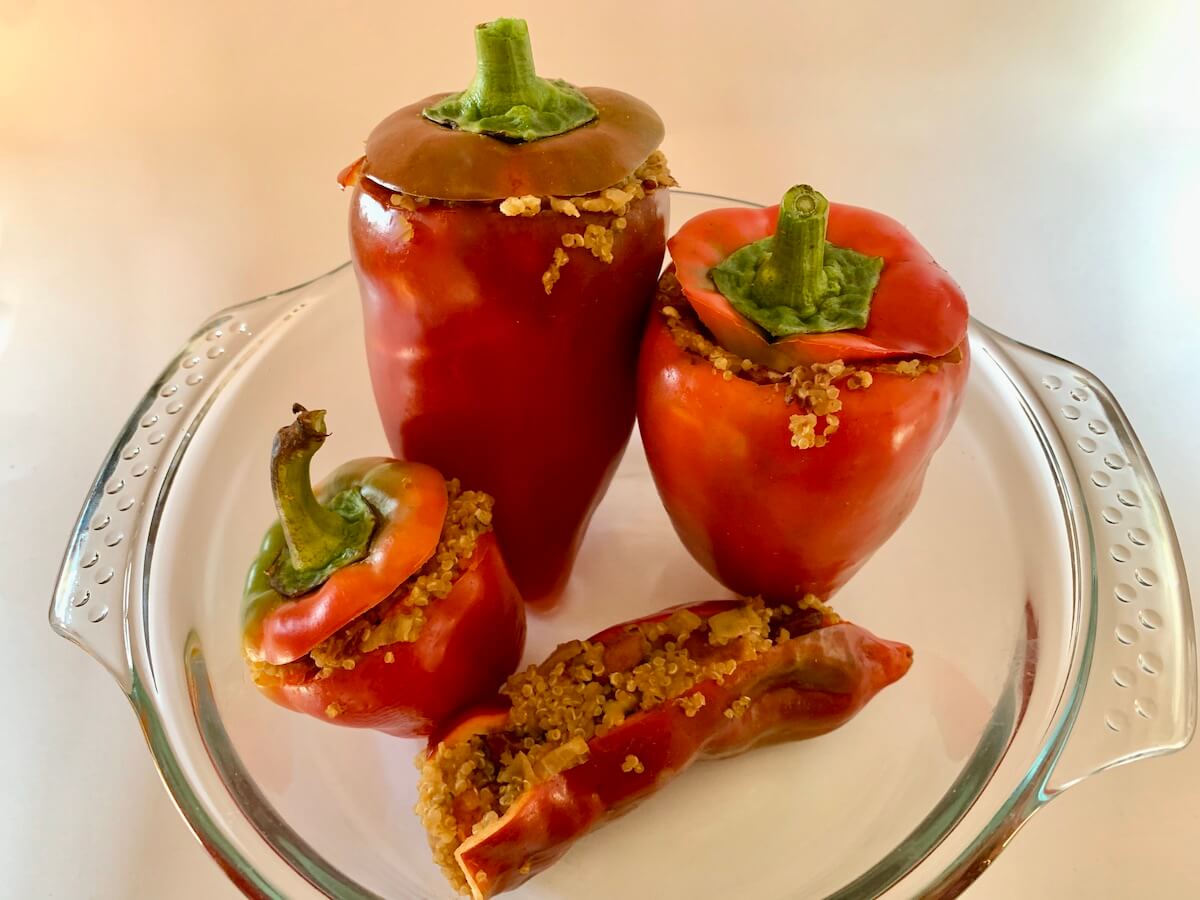 Four stuffed red peppers