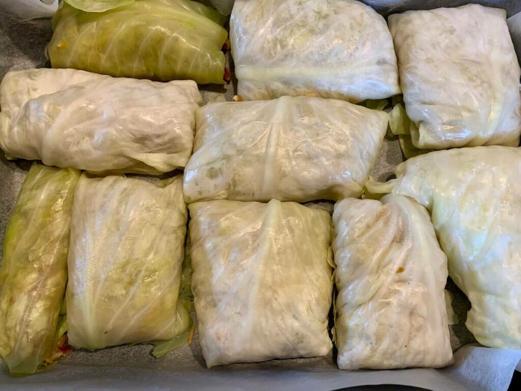 Pan full of vegan stuffed cabbage rolls