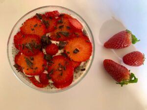 View from above of strawberry chia seed pudding in a bowl