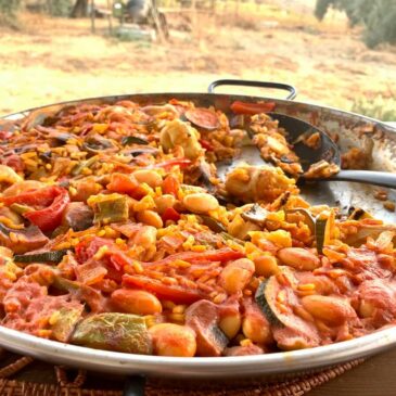 Paella on a table in the garden