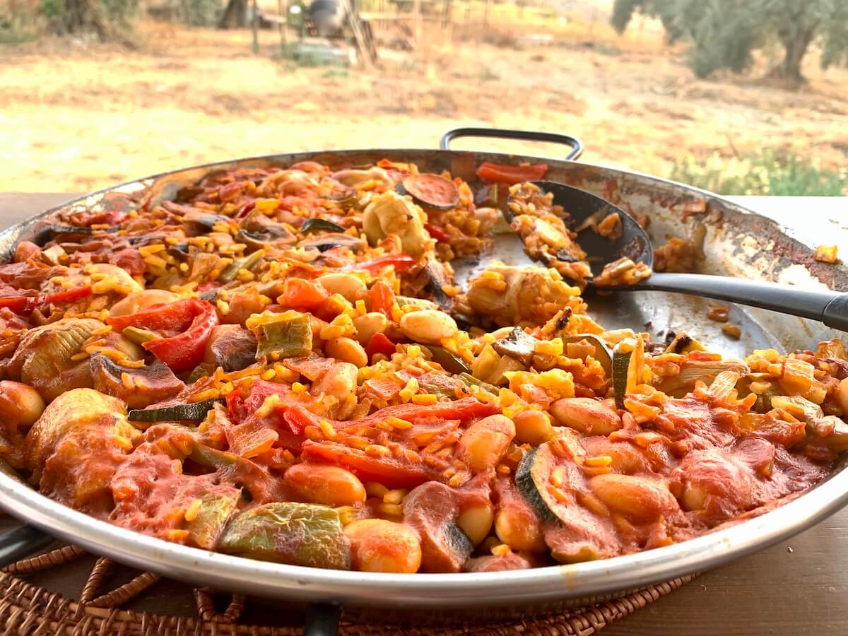 Paella on a table in the garden