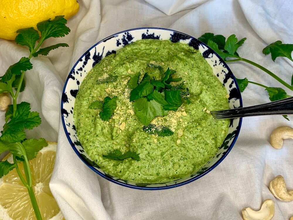 Vegan cilantro pesto recipe in a blue bowl