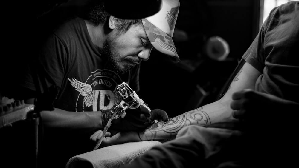 Tattoo artist at work - are tattoos vegan?
