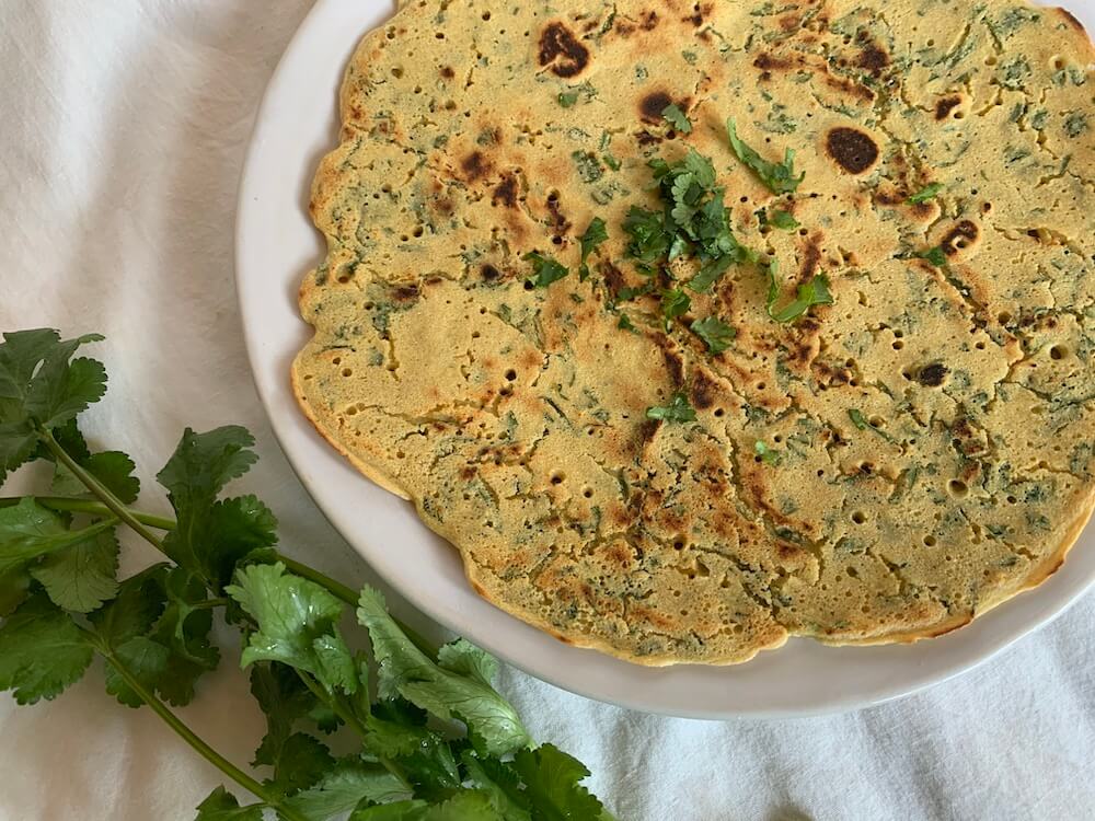 Gram flour flatbread with fresh cilantro