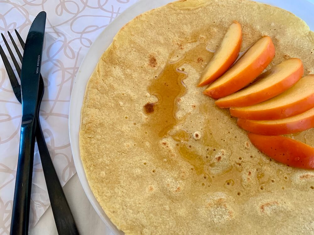 Gram flour flatbread with maple syrup and kaki fruit