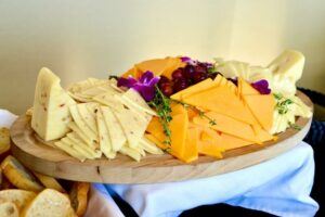 platter of cheese slices - Why is vegan cheese so bad?