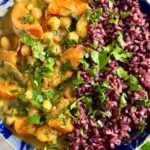 Easy sweet potato with chickpeas in coconut sauce served with rice