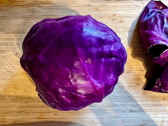 Whole purple cabbage with outer leaves removed