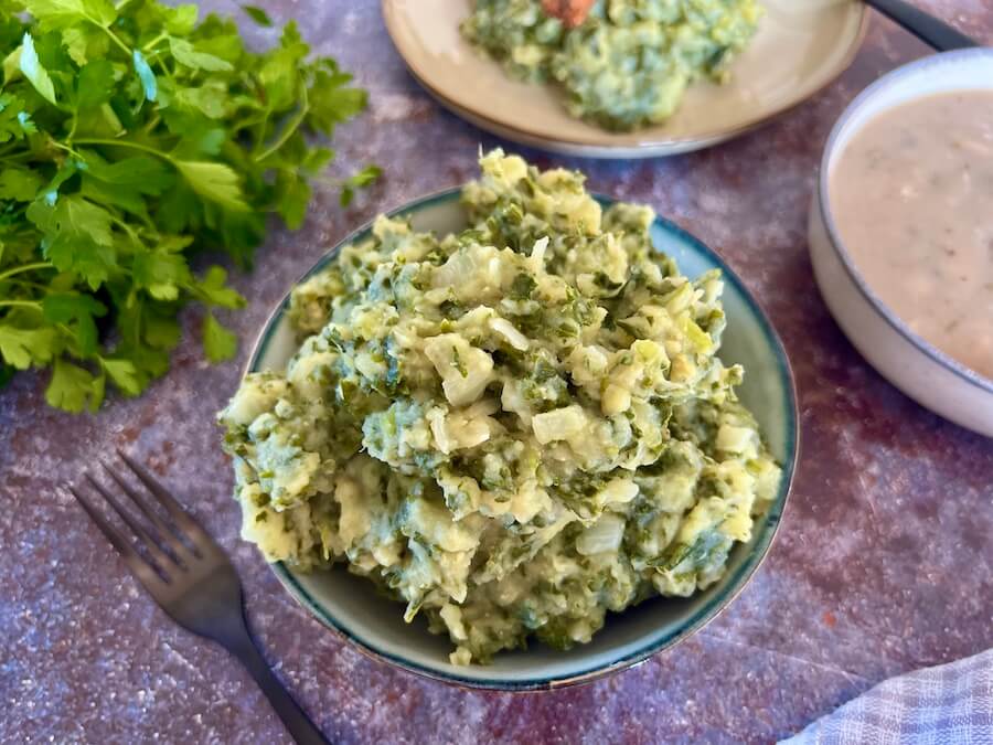 bowl of boerenkool stamppot (mashed potato, onion and kale)