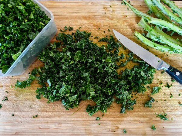Chopped kale on a chopping board. 