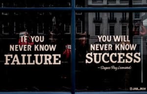 Why do I give up so easily? Shop window with the words written on it; If you never know failure, you will never know success.